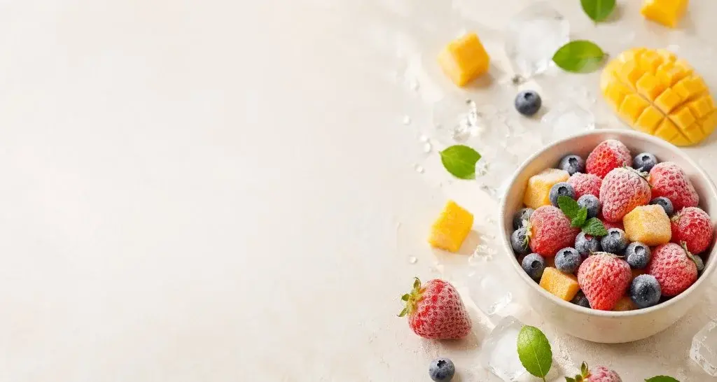 Cinematic Frozen Fruit Bowl on Beige Background